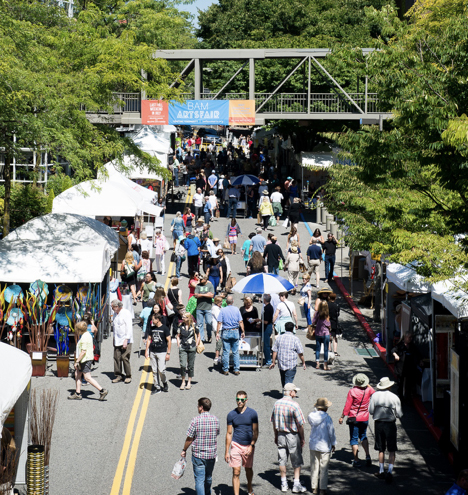 BAM ARTSfair street view with crowds and booths outside of Bellevue Square.