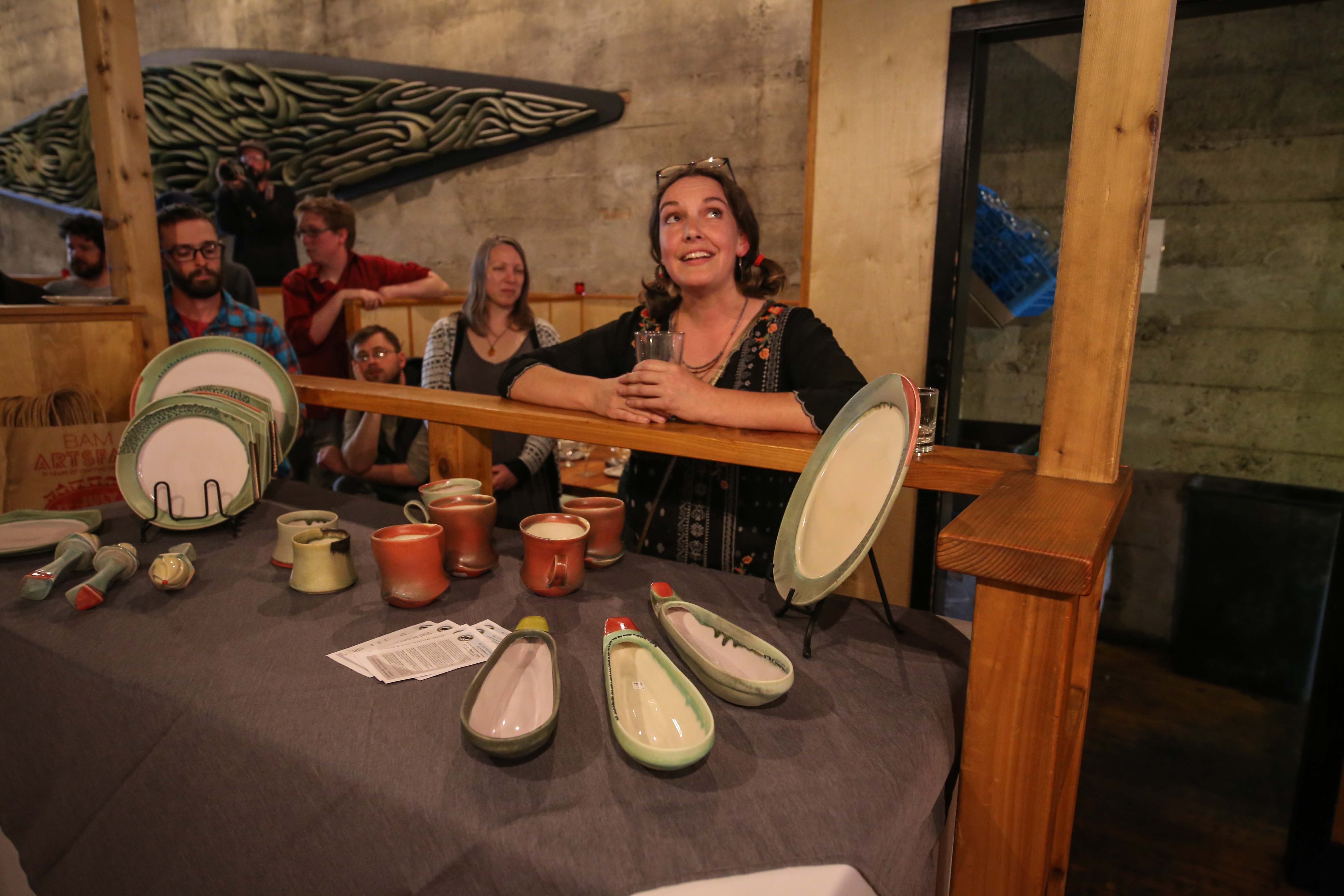 Artist Deborah Schwartzkopf with some of her work on display.