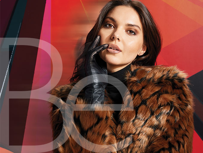 Model in faux fur coat for fall Be. Magazine.