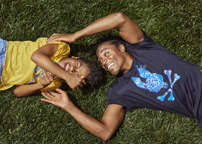 Dad and son wearing Psycho Bunny t-shirts