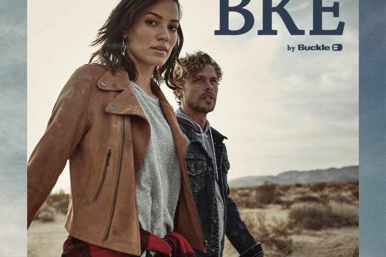 A man and woman model Buckle's fall fashions, including their world-class denim.