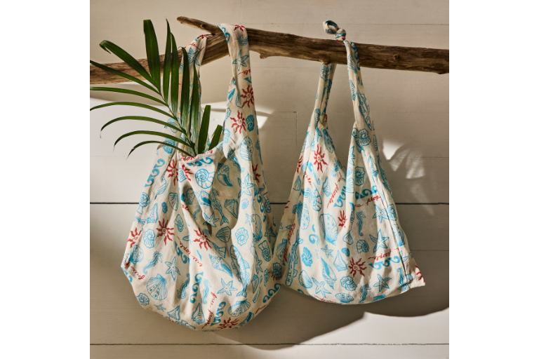 From the store to the shore—your must-have bag is here! Get it free with any in-store Free People purchase.