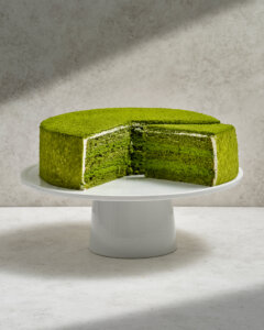 A must for any fan of Japanese green tea, our unique Green Tea Mousse Cake alternates a delicate green tea sponge cake with an ethereal green tea mousse. A lush coating of fresh whipped cream and dusting of green tea cake crumbs complete the cake.