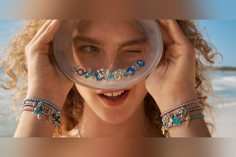 Dive in with colorful charms in 14k gold plating or sterling silver, featuring vibrant Murano glass and sparkling man-made stones.